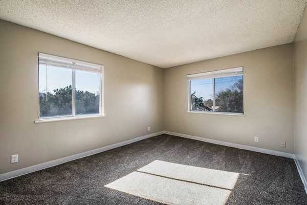 Inviting bedroom with modern decor at Calero Apartments