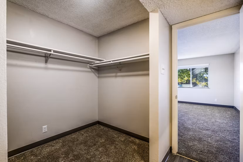Spacious bedroom closet with ample storage in Calero Apartments luxury apartments