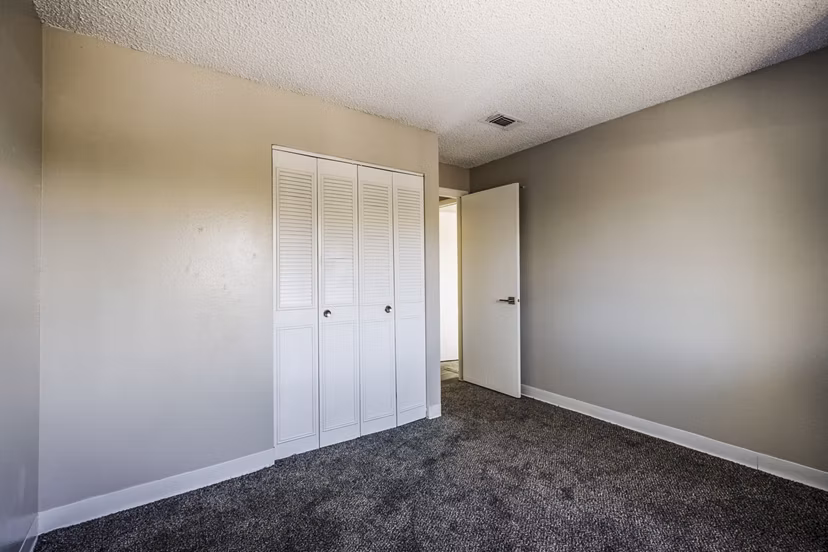 Modern bedroom with stylish decor in Calero Apartments, highlighting luxury living Ideal space for comfort seekers in Greystar's community