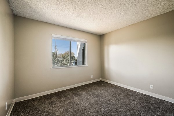 Elegant bedroom with modern decor in Calero Apartments, luxury living by Greystar
