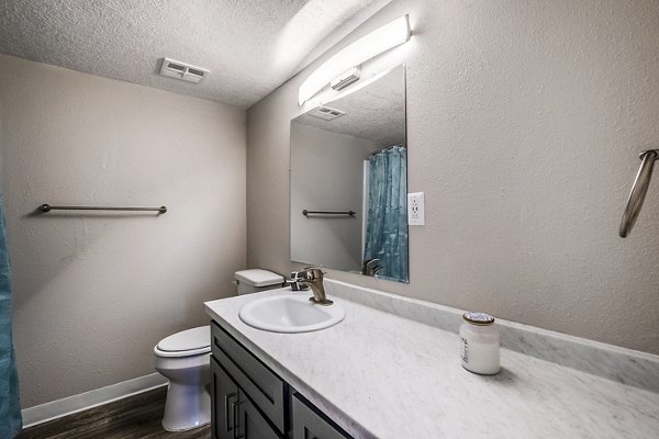 Modern bathroom with sleek fixtures at Calero Apartments