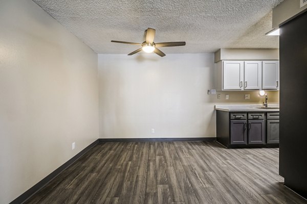 Dining room featuring elegant design and natural lighting at Calero Apartments