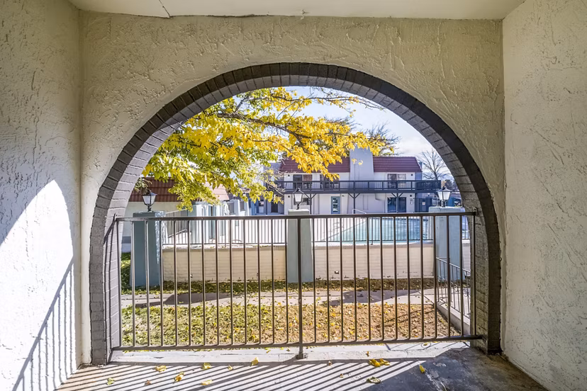 Outdoor patio with seating area at Calero Apartments