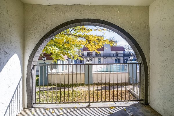Outdoor patio with seating area at Calero Apartments