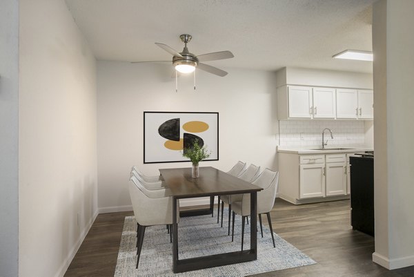 Dining area with modern furnishings in Milo Apartments, Greystar luxury complex