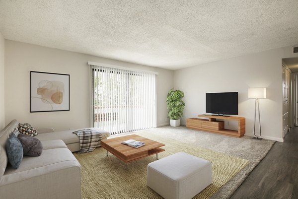 Spacious living room with modern decor at Milo Apartments, part of the Greystar luxury apartments collection