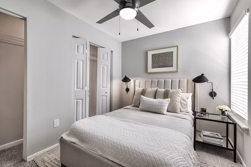 Bedroom featuring modern design and cozy ambiance at Oltera in SoEast Apartments