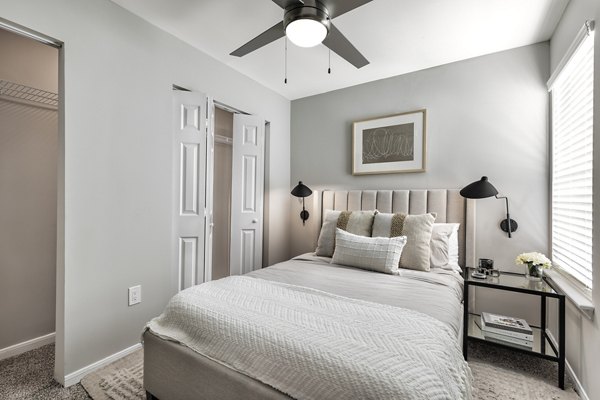 Bedroom featuring modern design and cozy ambiance at Oltera in SoEast Apartments