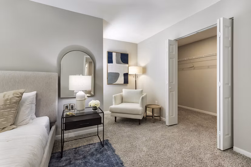 Modern bedroom with designer furnishings at Oltera in SoEast Apartments