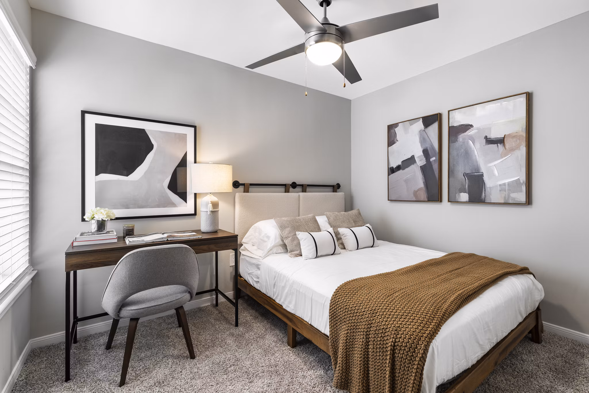 Cozy bedroom with modern decor at Oltera in SouthEast Apartments, offering comfort and luxury living