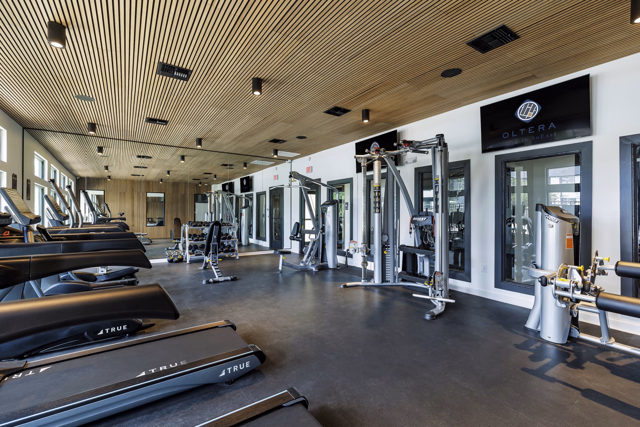 Modern fitness center with state-of-the-art equipment at Oltera in SoEast Apartments