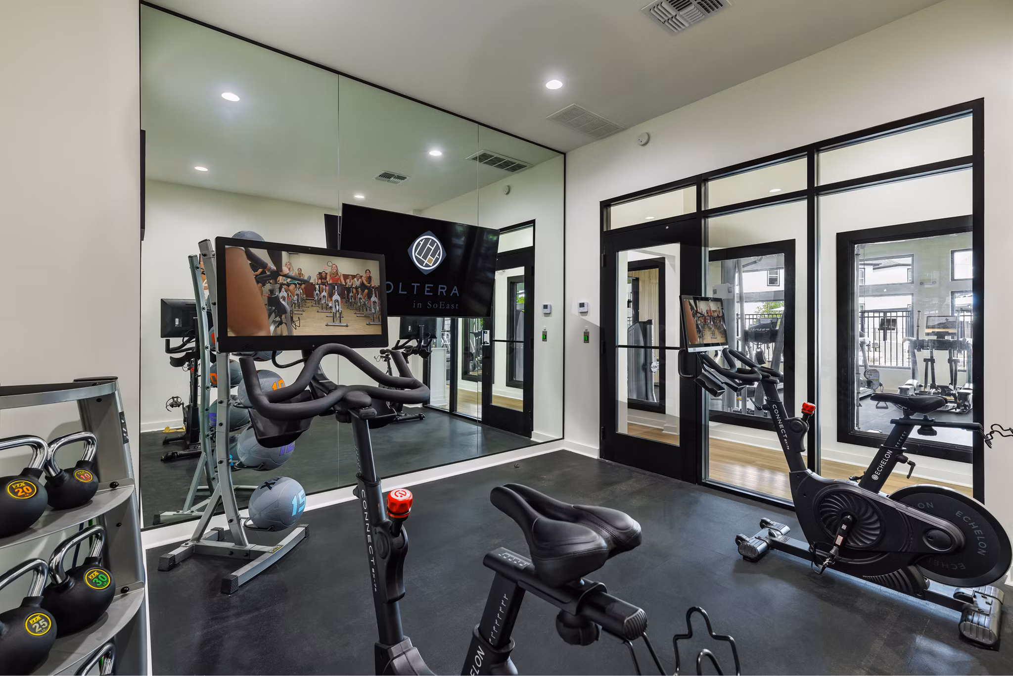 Modern fitness center with state-of-the-art equipment at Oltera in SoEast Apartments, promoting a healthy lifestyle for residents