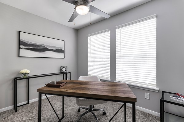 Spacious living area with modern dÃ©cor at Oltera in SoEast Apartments