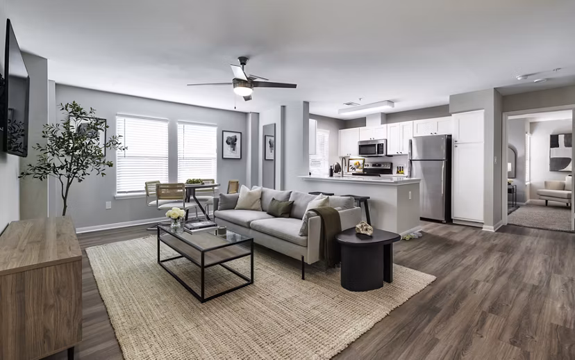 Spacious living room with contemporary design elements at Oltera in SoEast Apartments