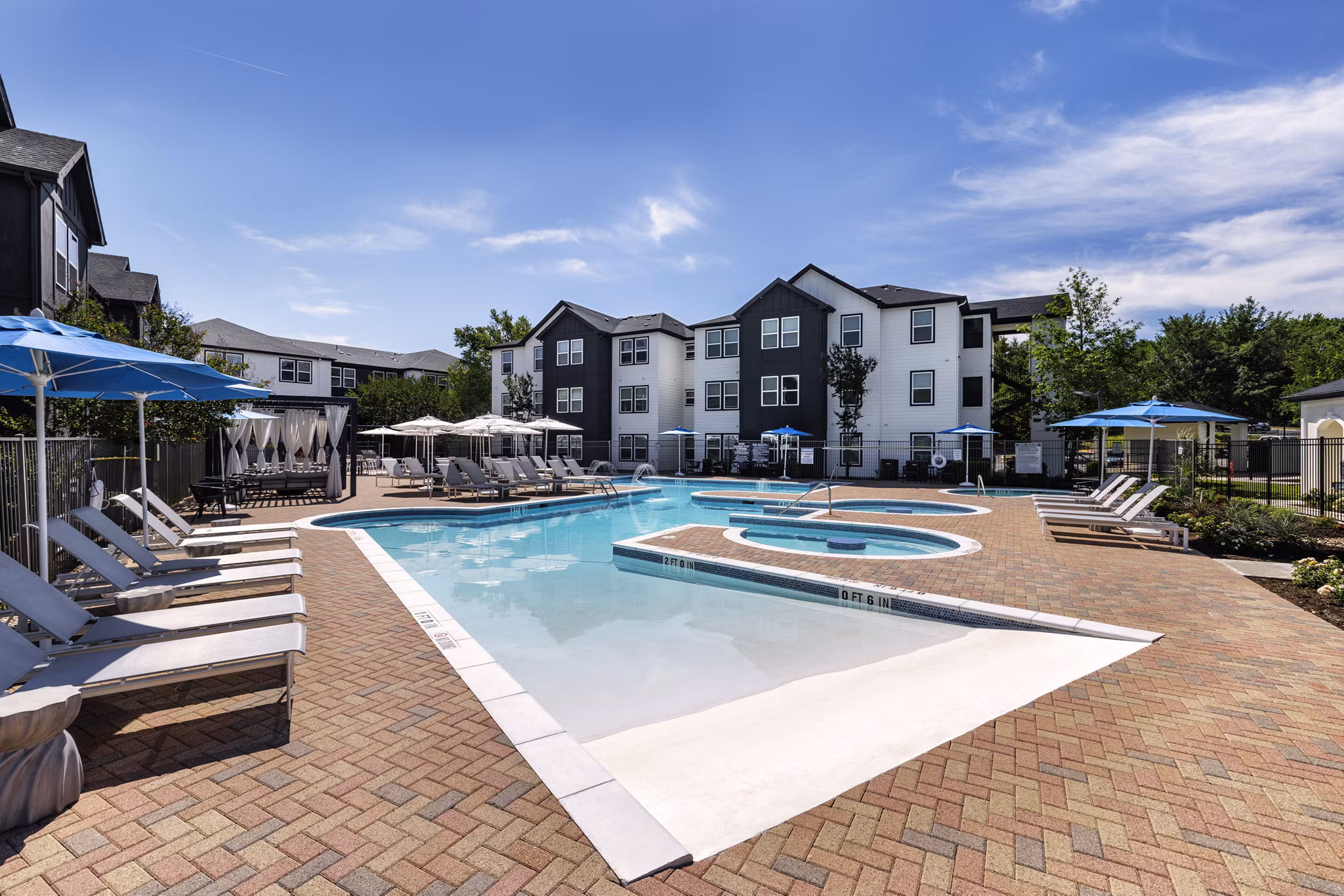 Luxurious outdoor pool at Oltera in SoEast Apartments, offering a relaxing space with modern design for residents to enjoy