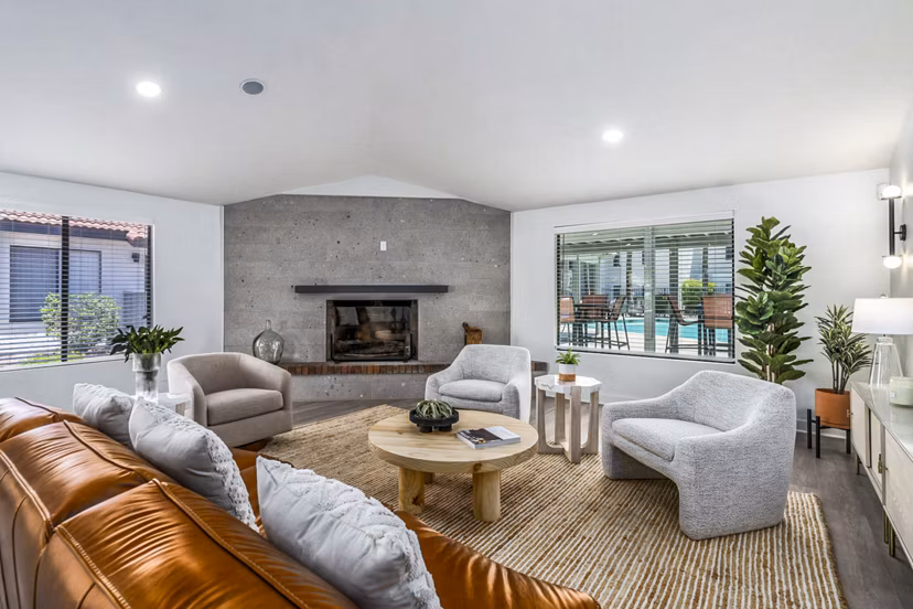 Clubhouse lobby with elegant seating and modern decor at Sparro Apartments