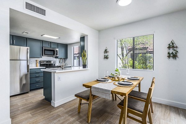 Dining room featuring elegant lighting and modern decor in Desert Shadows Apartments