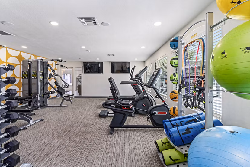 State-of-the-art fitness center with modern equipment at Desert Shadows Apartments