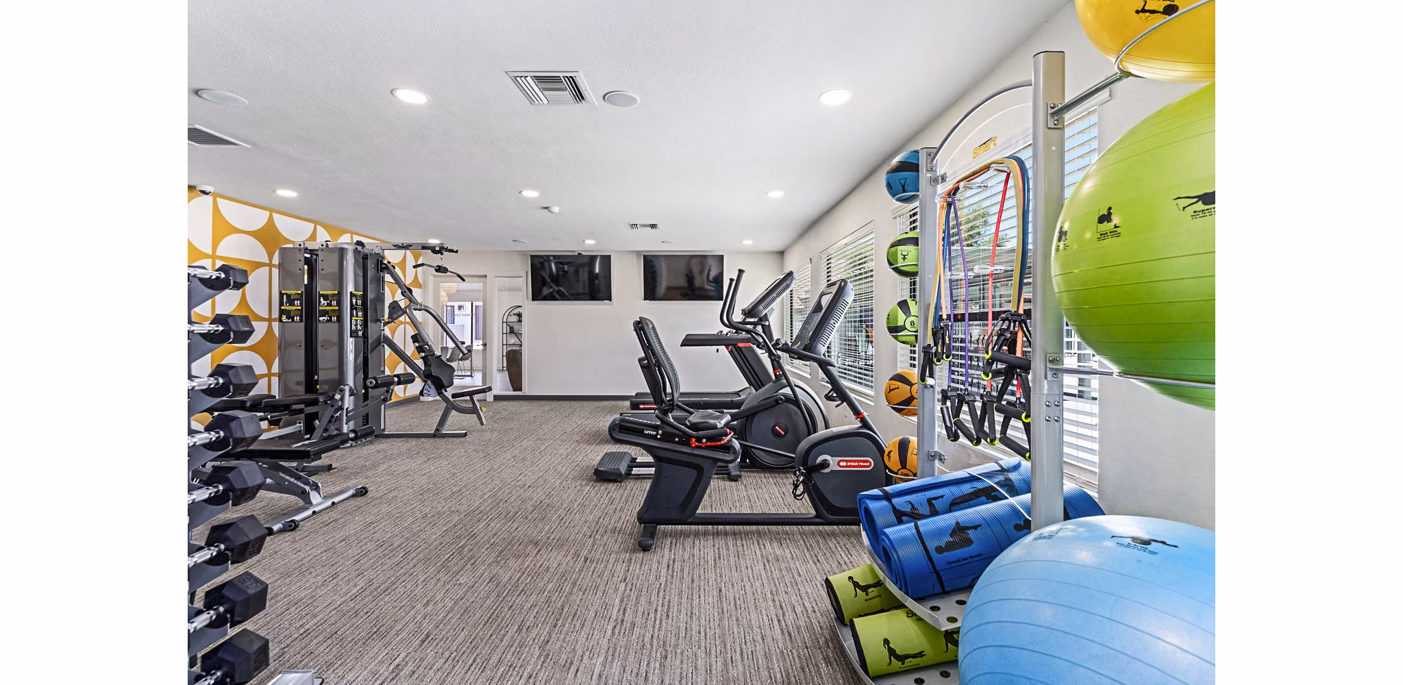 State-of-the-art fitness center with modern equipment at Desert Shadows Apartments