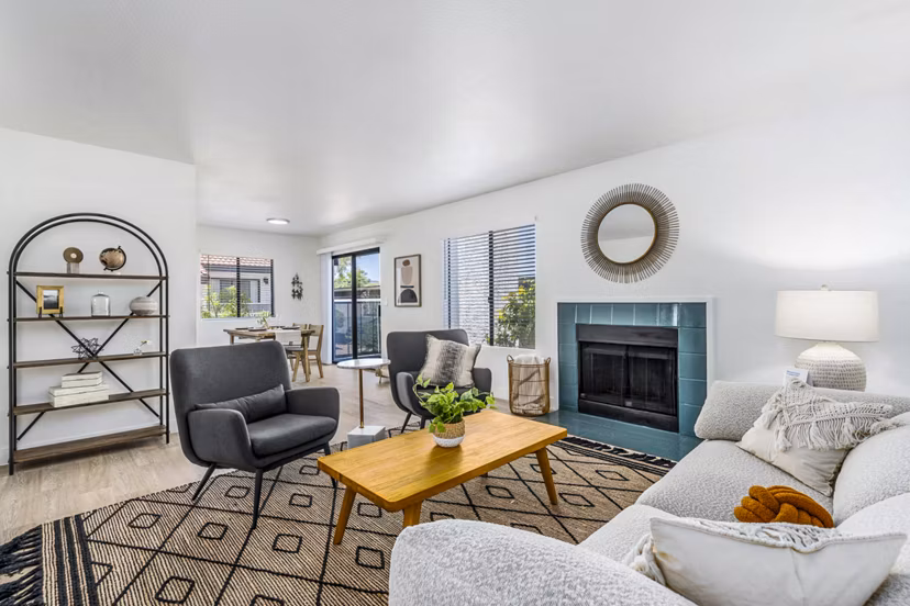 Sunlit living room with modern furnishings at Desert Shadows Apartments, a Greystar luxury community
