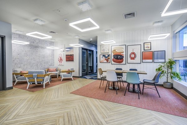 Clubhouse meeting facility at Union Tuscaloosa Apartments offering modern design and versatile spaces for gatherings and events