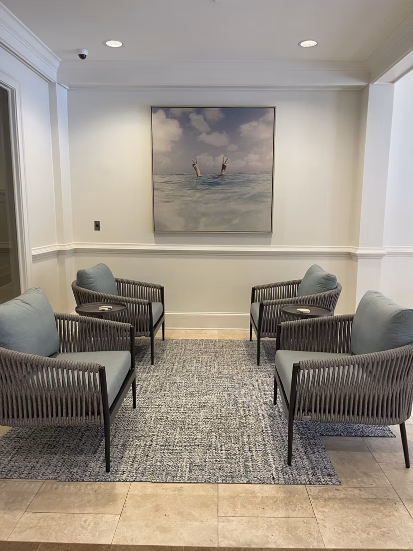 Clubhouse featuring modern design and cozy seating at Westmount Ashwood Apartments