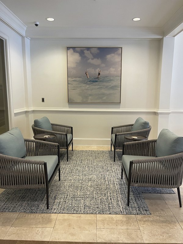 Clubhouse featuring modern design and cozy seating at Westmount Ashwood Apartments