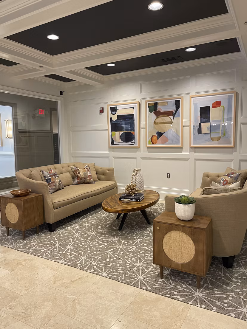 Clubhouse featuring modern decor and seating at Westmount Ashwood Apartments