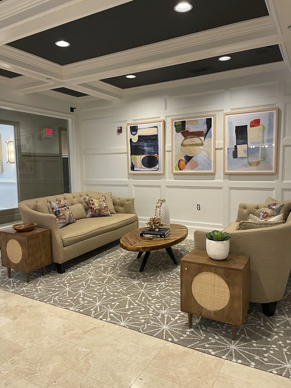 Clubhouse featuring modern decor and seating at Westmount Ashwood Apartments