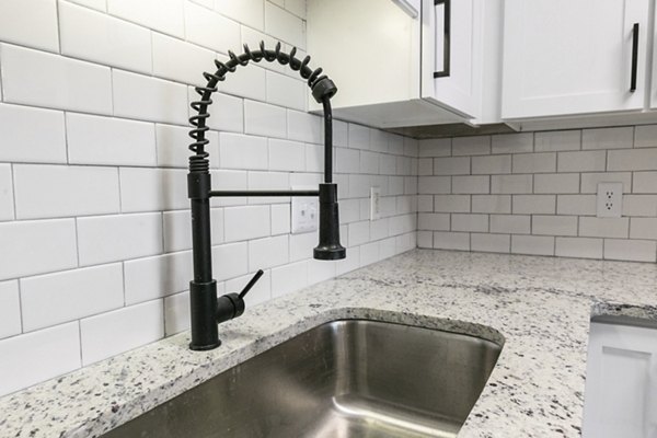 Modern kitchen with sleek appliances at Westmount Ashwood Apartments