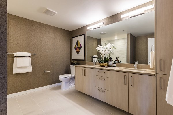 Bathroom featuring modern fixtures at Arista Apartments