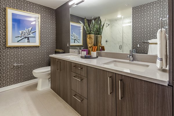 Modern bathroom with sleek fixtures at Arista Apartments, featuring luxurious amenities and contemporary design