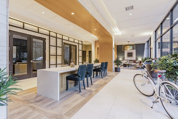Clubhouse with elegant seating and modern design at Arista Apartments