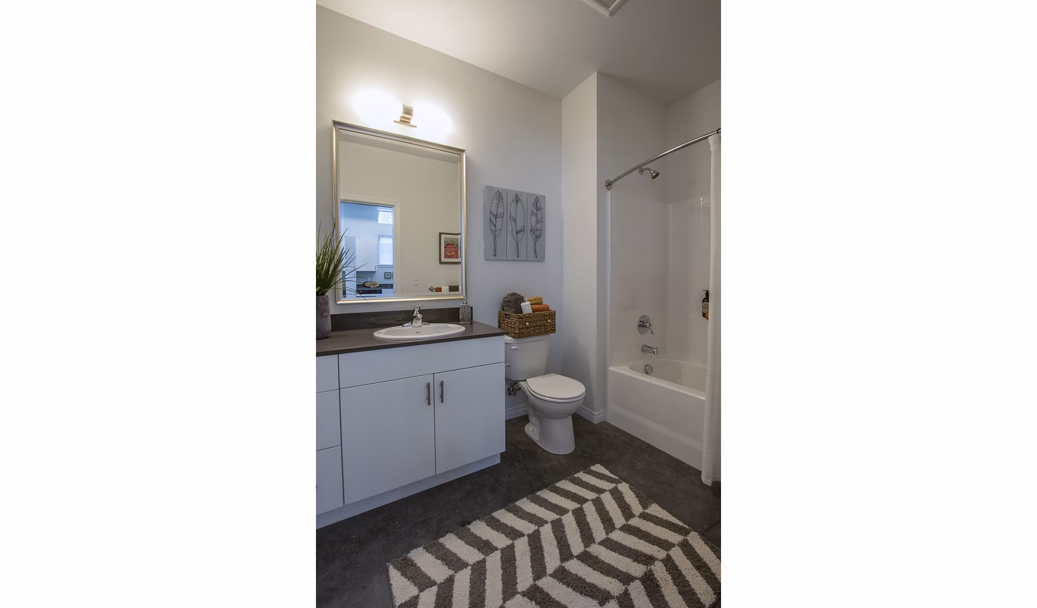 Modern bathroom with sleek fixtures in Spencer 68 Apartmentsâ€