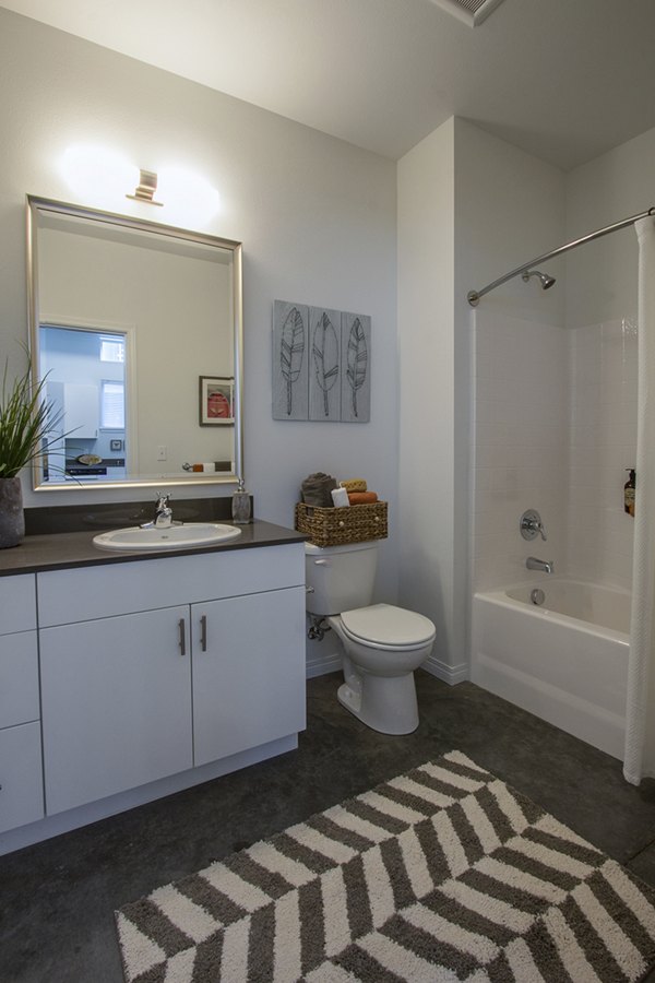 Modern bathroom with sleek fixtures in Spencer 68 Apartmentsâ€