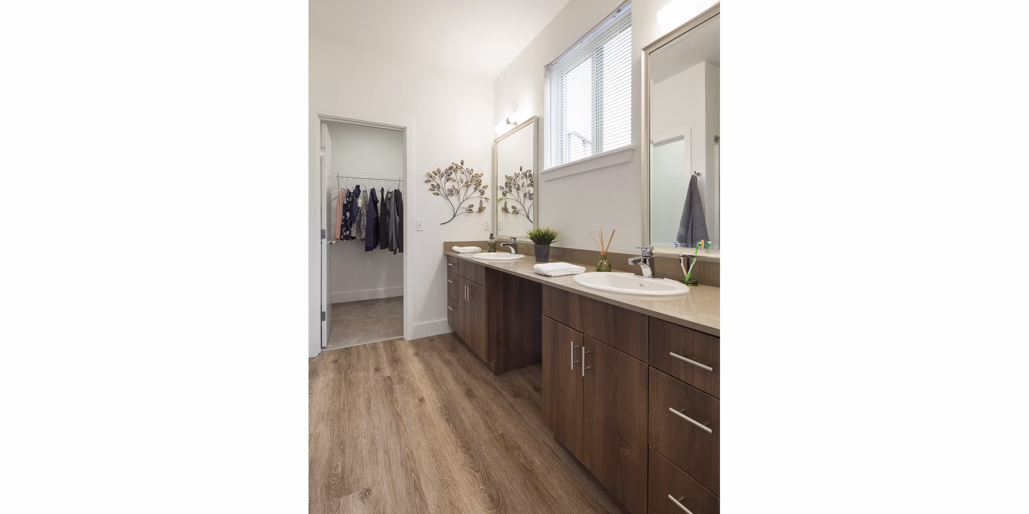 Modern bathroom with elegant fixtures in Spencer 68 Apartments, showcasing luxury living amenities in a stylish, contemporary setting