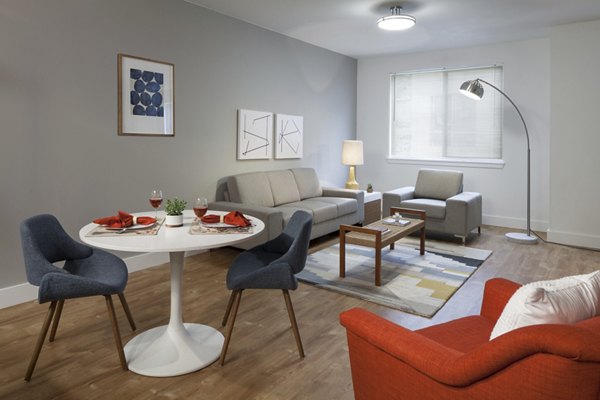 Dining room featuring modern decor and open layout at Spencer 68 Apartments
