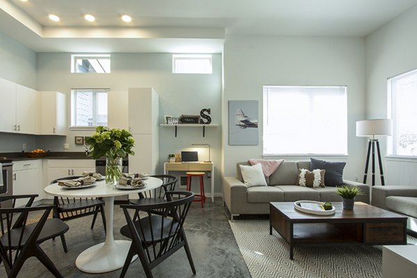 Elegant dining area with modern decor at Spencer 68 Apartments
