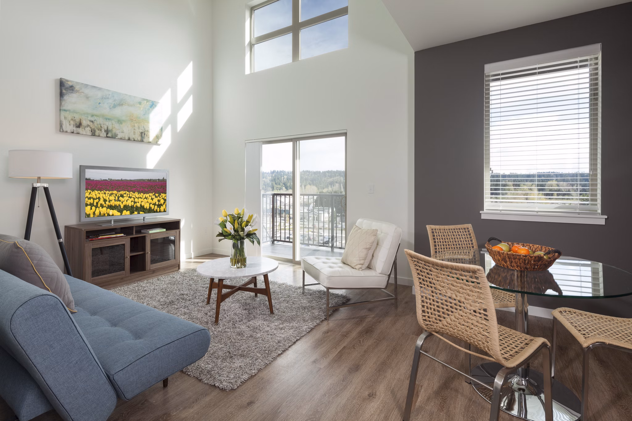 Luxurious living room with modern design and cozy seating at Spencer 68 Apartments in Kenmore, embodying elegant comfort and style