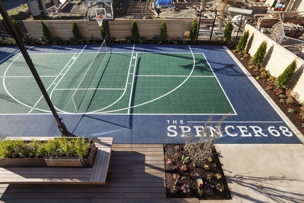 Sport court for basketball and tennis at Spencer 68 Apartments, featuring modern surfaces for active lifestyles in Kenmore
