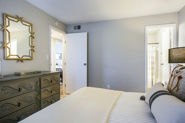 Elegant bedroom with modern decor at The Mica Apartments in downtown Seattle, offering luxury living in Greystar's renowned style