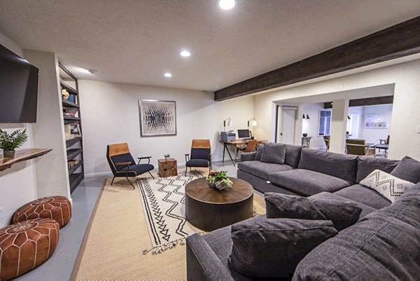 Modern clubhouse with leisure and entertainment spaces at The Mica Apartments Enjoy community events and premium amenities in this luxury setting