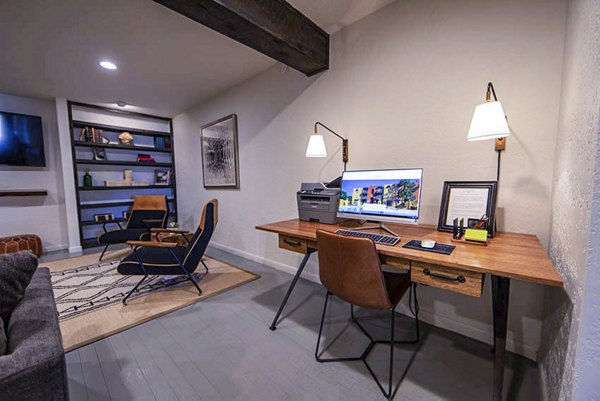 Elegant clubhouse with modern decor at The Mica Apartments offering luxurious living spaces for social gatherings and events