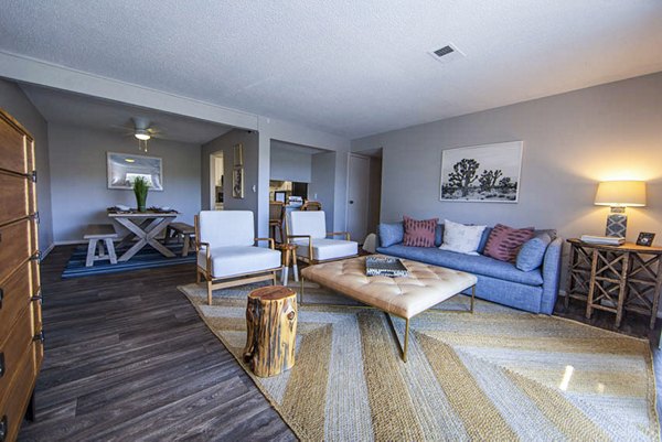 Modern living room with sleek design and high-quality furnishings at The Mica Apartments, offering a luxury living experience