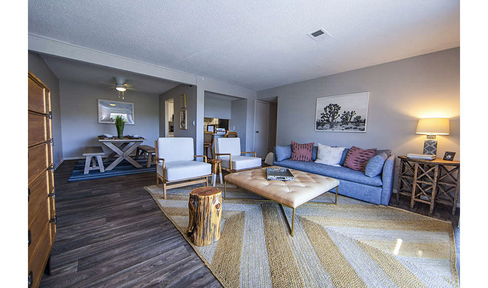 Modern living room with sleek design and high-quality furnishings at The Mica Apartments, offering a luxury living experience