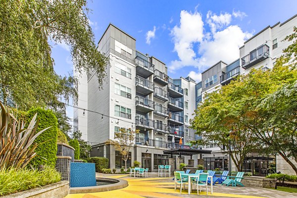 Peaceful courtyard with lush landscaping at Solara Apartments, perfect for relaxing in a Greystar luxury apartment community