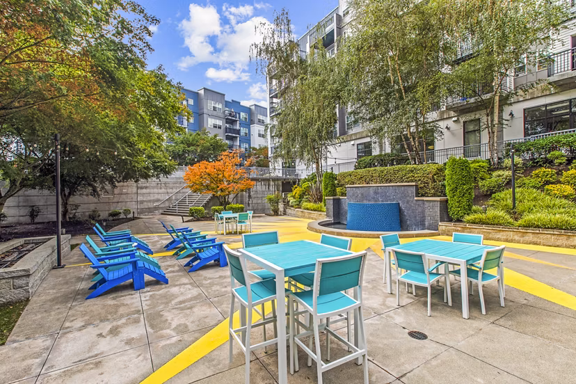 Charming courtyard patio with modern seating at Solara Apartments