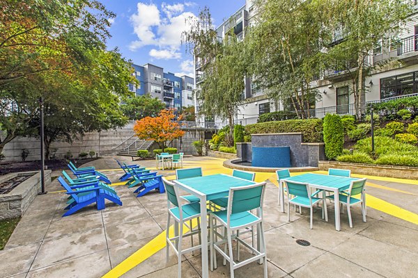 Charming courtyard patio with modern seating at Solara Apartments
