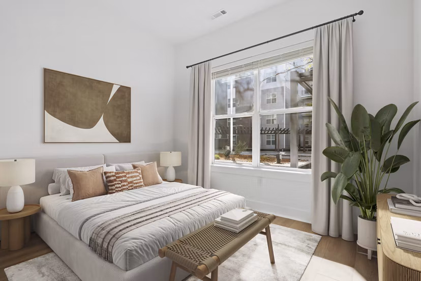 Modern bedroom with sleek furnishings at Atmark Apartments in Cambridge