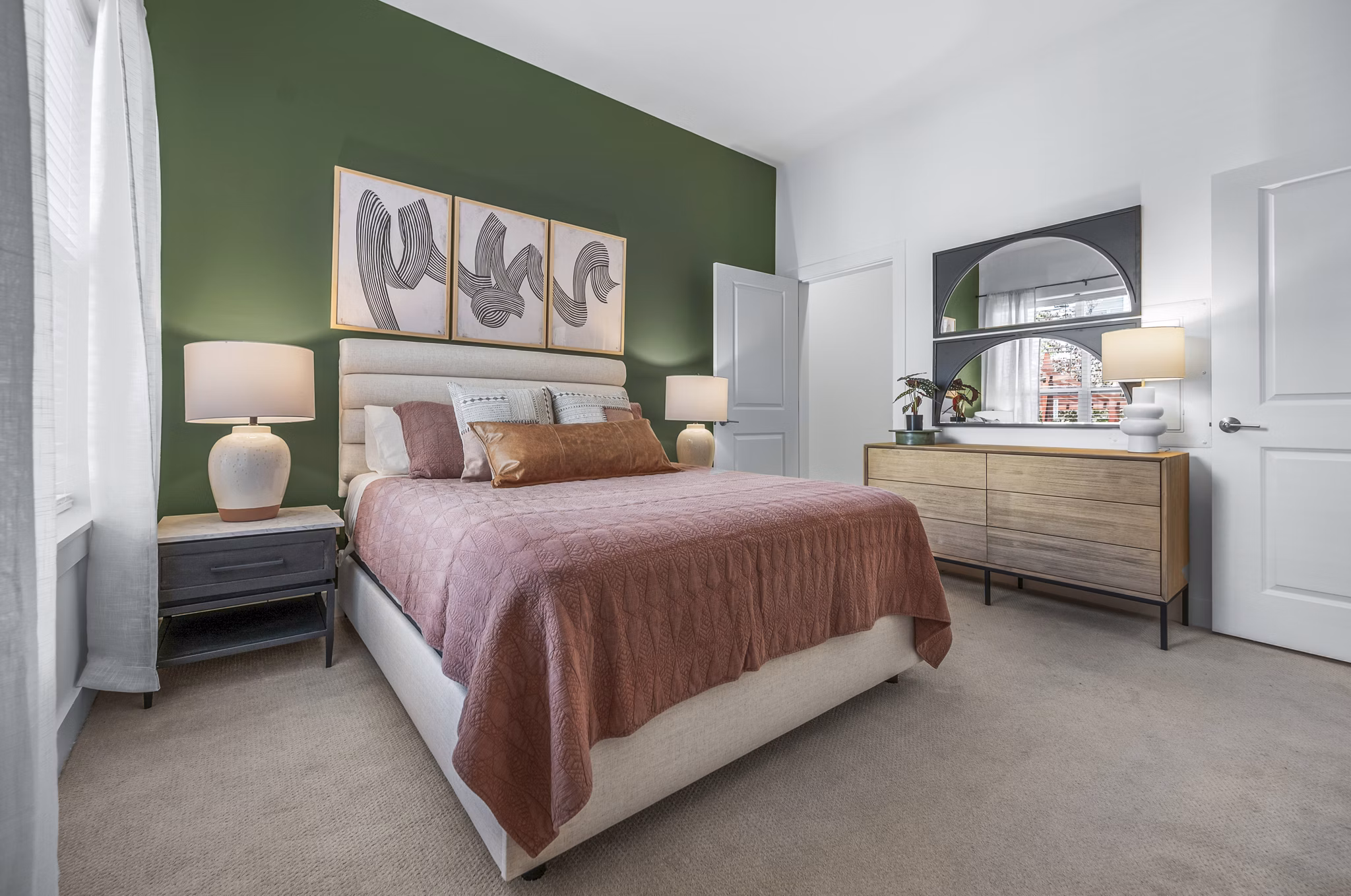 Modern bedroom with sleek furnishings at Atmark Apartments in Cambridge